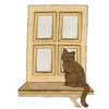 CAT SITTING IN WINDOW